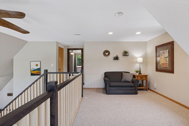 708 Riverside Dr N, North Hudson, WI 54016 - sitting room featuring ceiling fan, an upstairs landing, light carpet, and recessed lighting
