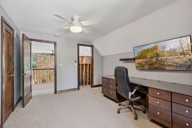 708 Riverside Dr N, North Hudson, WI 54016 - office area with light colored carpet, vaulted ceiling, a ceiling fan, and a textured ceiling