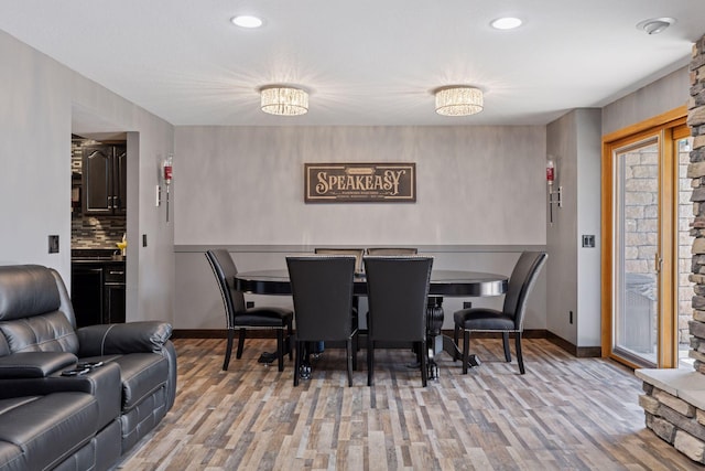708 Riverside Dr N, North Hudson, WI 54016 - dining room featuring wood finished floors and recessed lighting