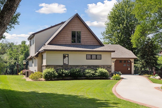 708 Riverside Dr N, North Hudson, WI 54016 - craftsman house featuring driveway, a garage, and roof with shingles