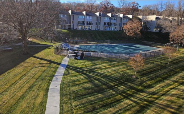 6201 Saint Croix Trl N Unit 115, Oak Park Heights, MN 55082 - view of swimming pool featuring a residential view