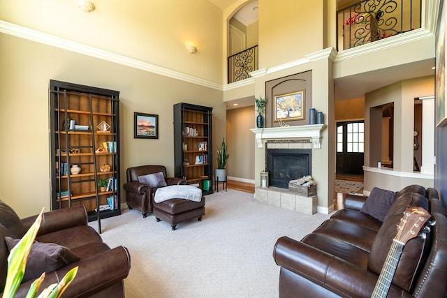 60515 235th St, Madison Lake, MN 56063 - carpeted living area featuring a tile fireplace and a towering ceiling