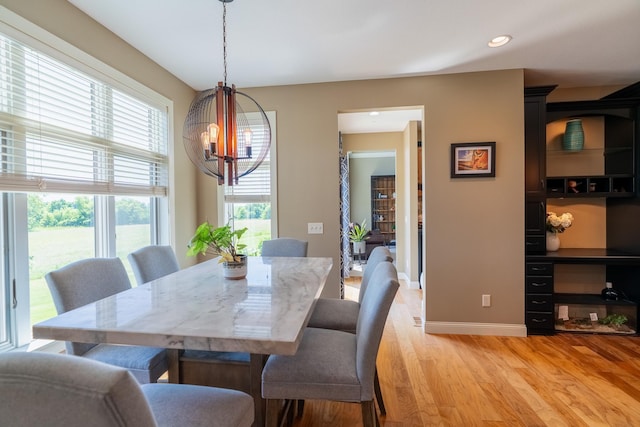 60515 235th St, Madison Lake, MN 56063 - dining area with a chandelier, light wood-type flooring, and recessed lighting