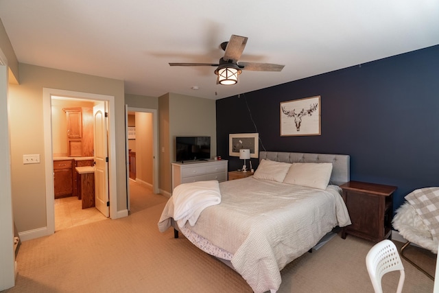 60515 235th St, Madison Lake, MN 56063 - bedroom with light colored carpet, a ceiling fan, and connected bathroom