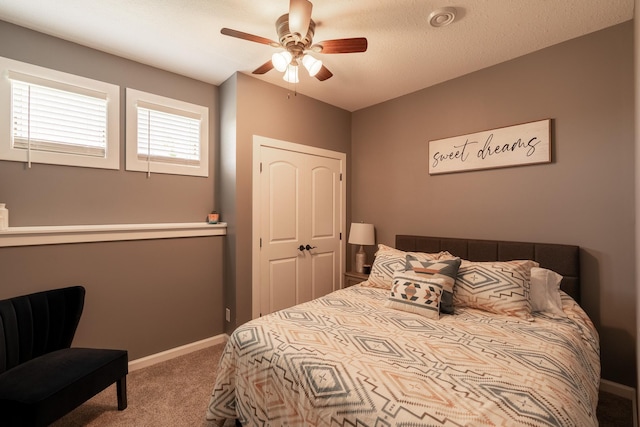 60515 235th St, Madison Lake, MN 56063 - carpeted bedroom with ceiling fan and baseboards