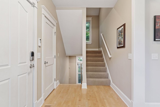 4312 France Ave S, Edina, MN 55410 - foyer entrance featuring light wood finished floors and stairs