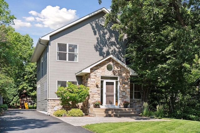 4312 France Ave S, Edina, MN 55410 - view of front of home featuring stone siding and asphalt driveway