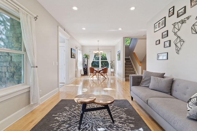 4312 France Ave S, Edina, MN 55410 - living area with a chandelier, light wood-type flooring, stairs, and recessed lighting