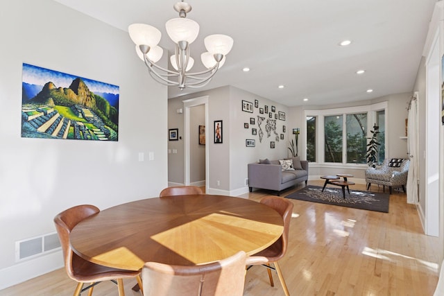 4312 France Ave S, Edina, MN 55410 - dining space featuring light wood-style floors, a chandelier, and recessed lighting