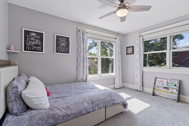 4312 France Ave S, Edina, MN 55410 - carpeted bedroom with baseboards and ceiling fan