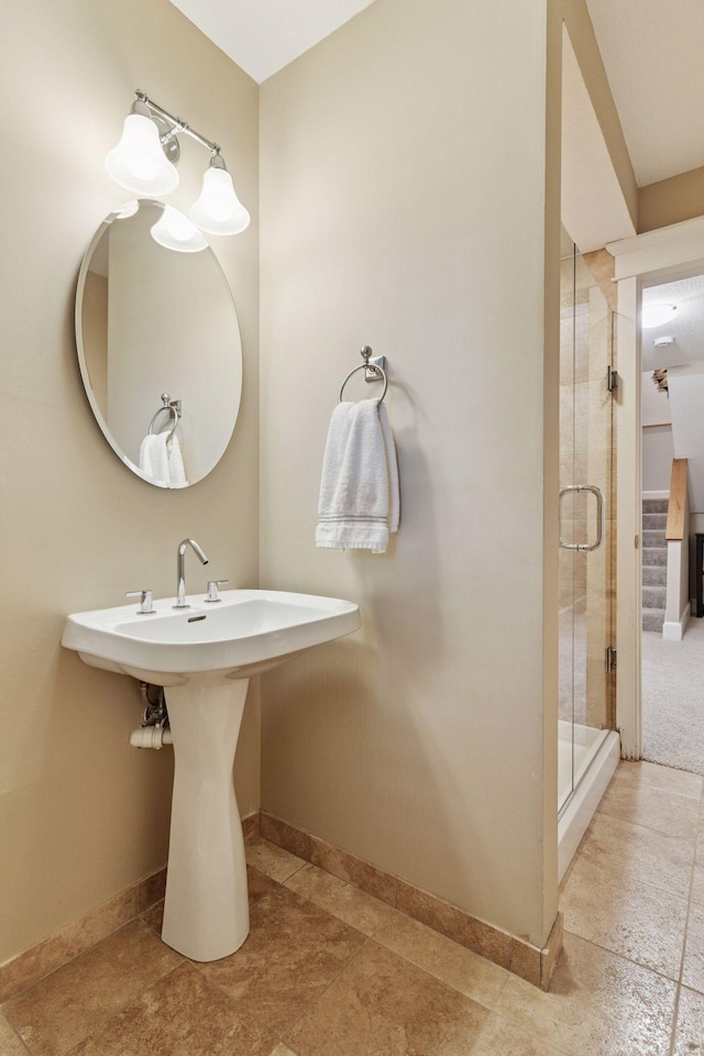 4312 France Ave S, Edina, MN 55410 - bathroom with a stall shower and baseboards