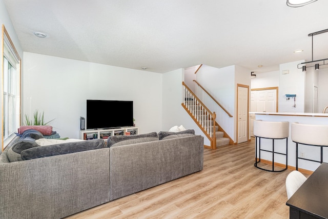 14399 Banyan Ln, Rosemount, MN 55068 - living area with stairs, light wood-type flooring, and recessed lighting