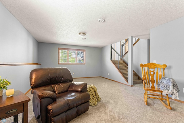 4515 Westport Pkwy, Fargo, ND 58078 - living area with carpet, stairs, and a textured ceiling