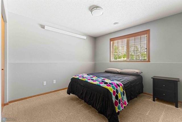 4515 Westport Pkwy, Fargo, ND 58078 - bedroom featuring carpet flooring and a textured ceiling