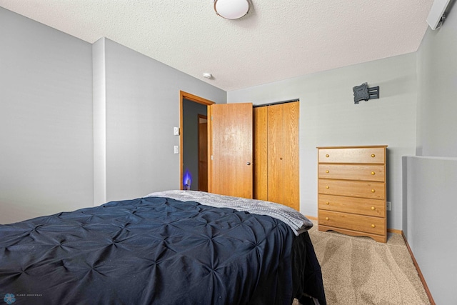 4515 Westport Pkwy, Fargo, ND 58078 - carpeted bedroom with a closet and a textured ceiling