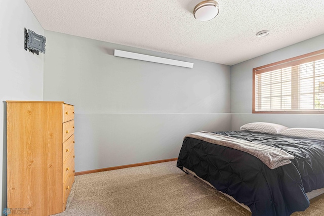 4515 Westport Pkwy, Fargo, ND 58078 - carpeted bedroom with a textured ceiling and baseboards