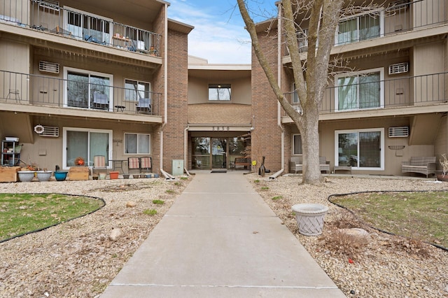 3850 Plymouth Blvd Unit 204, Plymouth, MN 55446 - view of building exterior with an AC wall unit