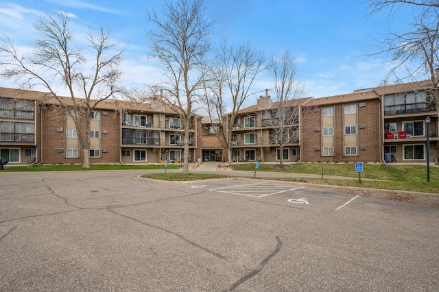 3850 Plymouth Blvd Unit 204, Plymouth, MN 55446 - view of building exterior with uncovered parking