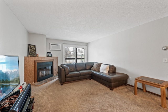 3850 Plymouth Blvd Unit 204, Plymouth, MN 55446 - living area featuring light carpet, a wall mounted air conditioner, a textured ceiling, and a glass covered fireplace