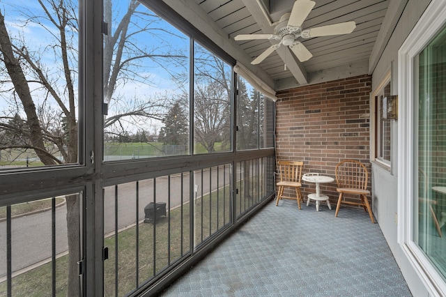 3850 Plymouth Blvd Unit 204, Plymouth, MN 55446 - sunroom / solarium featuring a ceiling fan, plenty of natural light, and beam ceiling