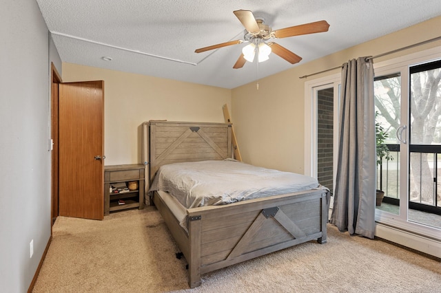 3850 Plymouth Blvd Unit 204, Plymouth, MN 55446 - bedroom with access to exterior, light colored carpet, a textured ceiling, and ceiling fan