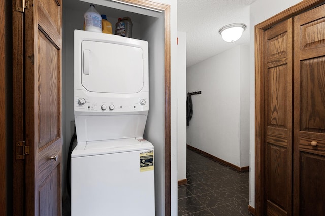 3850 Plymouth Blvd Unit 204, Plymouth, MN 55446 - laundry room with estacked washer and dryer and a textured ceiling