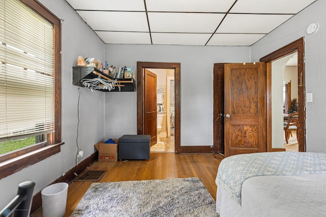 1329 12th St N, Fargo, ND 58102 - bedroom with a paneled ceiling and wood finished floors