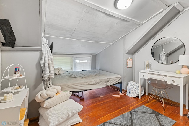 1329 12th St N, Fargo, ND 58102 - bedroom featuring wood-type flooring and lofted ceiling