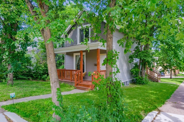 2700 Aldrich Ave N, Minneapolis, MN 55411 - view of front of home with covered porch and a front yard