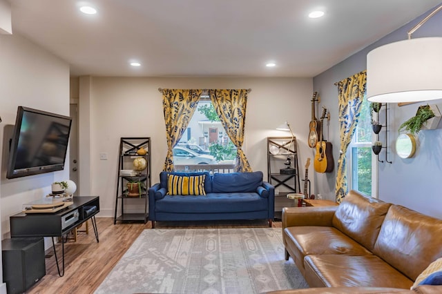 2700 Aldrich Ave N, Minneapolis, MN 55411 - living area featuring light wood-style floors and recessed lighting