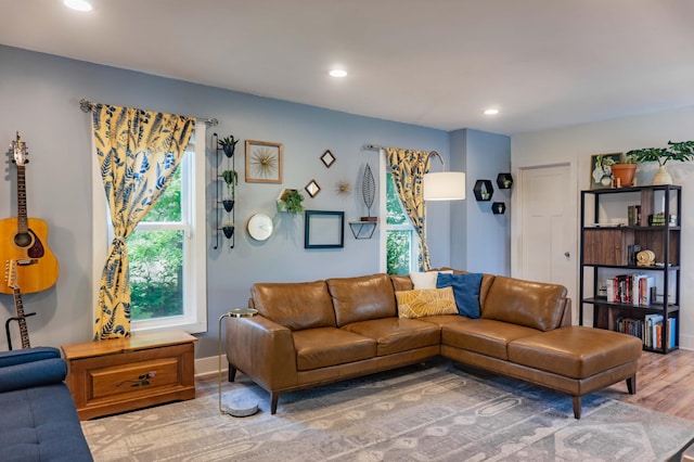 2700 Aldrich Ave N, Minneapolis, MN 55411 - living area featuring wood finished floors, recessed lighting, and healthy amount of natural light