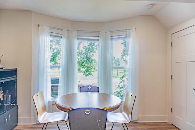 2700 Aldrich Ave N, Minneapolis, MN 55411 - dining room featuring light wood finished floors and baseboards