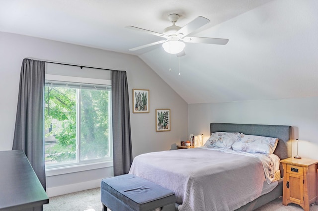 2700 Aldrich Ave N, Minneapolis, MN 55411 - bedroom featuring light colored carpet, vaulted ceiling, and a ceiling fan