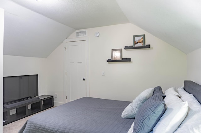 2700 Aldrich Ave N, Minneapolis, MN 55411 - carpeted bedroom with vaulted ceiling