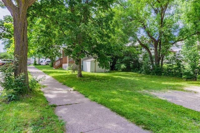 2700 Aldrich Ave N, Minneapolis, MN 55411 - view of grassy yard with a shed