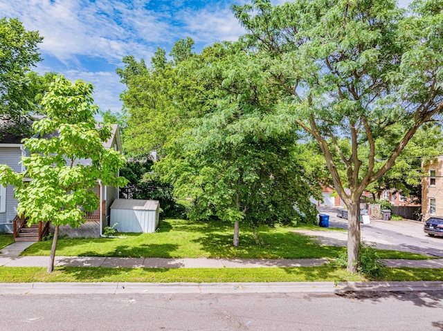 2700 Aldrich Ave N, Minneapolis, MN 55411 - obstructed view of property with a shed and a front lawn