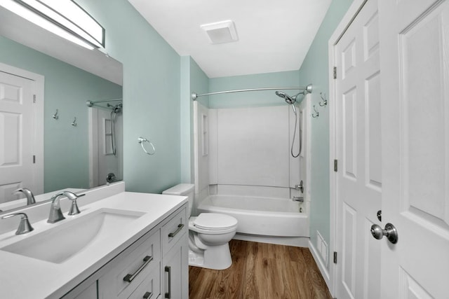 3615 156th St W, Rosemount, MN 55068 - bathroom featuring vanity, wood finished floors, and shower / tub combination