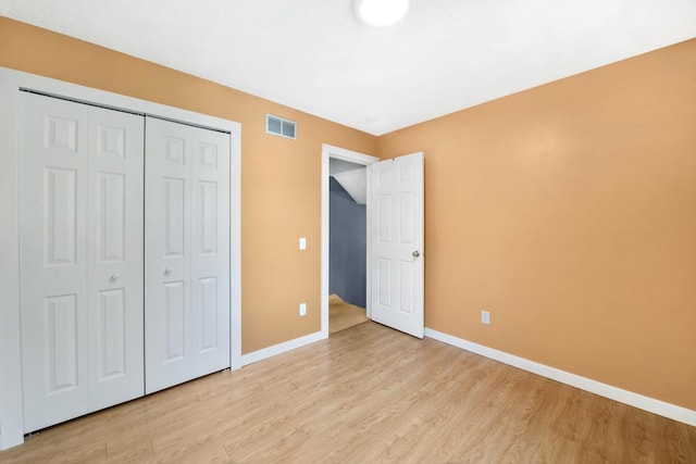 3615 156th St W, Rosemount, MN 55068 - unfurnished bedroom with light wood finished floors and a closet