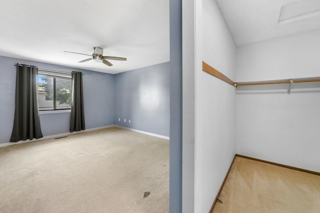 3615 156th St W, Rosemount, MN 55068 - spacious closet featuring carpet, ceiling fan, and attic access