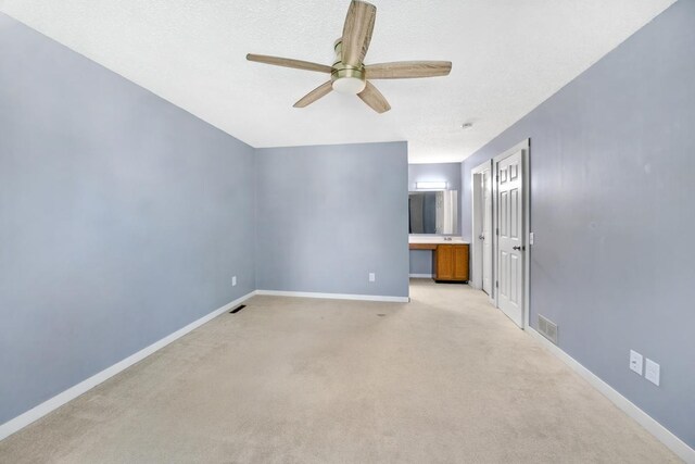 3615 156th St W, Rosemount, MN 55068 - spare room with a ceiling fan and light colored carpet
