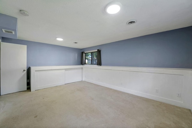 3615 156th St W, Rosemount, MN 55068 - carpeted spare room featuring a smoke detector and a textured ceiling