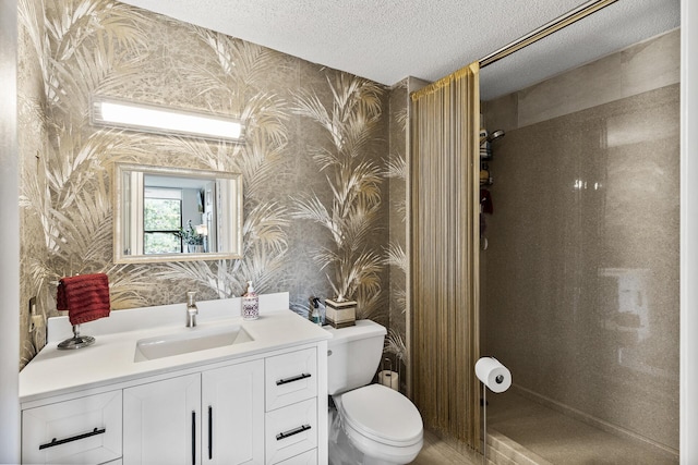 6615 Lake Shore Dr S Unit 314, Richfield, MN 55423 - bathroom with wallpapered walls, a stall shower, vanity, and a textured ceiling