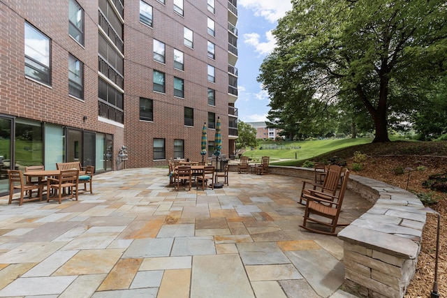 6615 Lake Shore Dr S Unit 314, Richfield, MN 55423 - view of patio with outdoor dining area