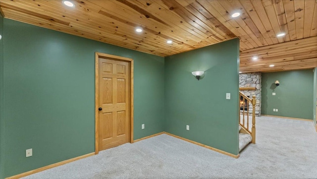 12720 Ibis St NW, Coon Rapids, MN 55448 - carpeted empty room featuring wood ceiling, recessed lighting, and stairs