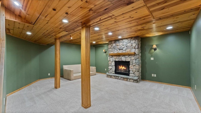 12720 Ibis St NW, Coon Rapids, MN 55448 - finished below grade area featuring wooden ceiling, carpet floors, recessed lighting, and a stone fireplace