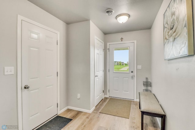 401 7th St E, Horace, ND 58047 - entryway with light wood-style floors and baseboards