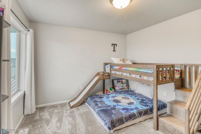 401 7th St E, Horace, ND 58047 - bedroom featuring carpet floors and baseboards