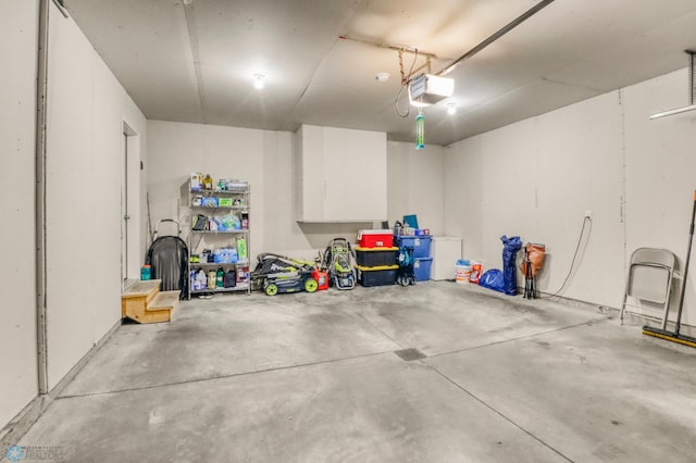401 7th St E, Horace, ND 58047 - garage featuring a garage door opener