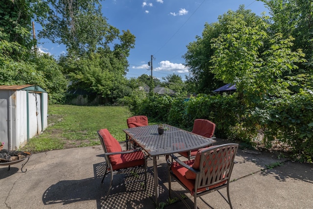 700 6th St E, Saint Paul, MN 55106 - view of patio with a shed and outdoor dining area