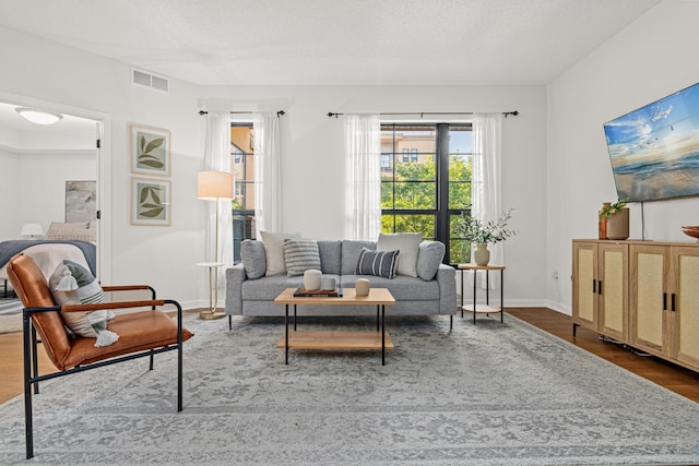2566 Ellis Ave Unit 103, Saint Paul, MN 55114 - living area with wood finished floors and baseboards